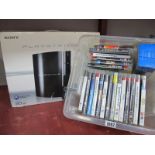 PlayStation 3 (untested sold for parts only), plus twenty PS3 games, car adaptor.