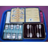 A Set of Six Hallmarked Silver Teaspoons, in a fitted case; together with a set of five hallmarked
