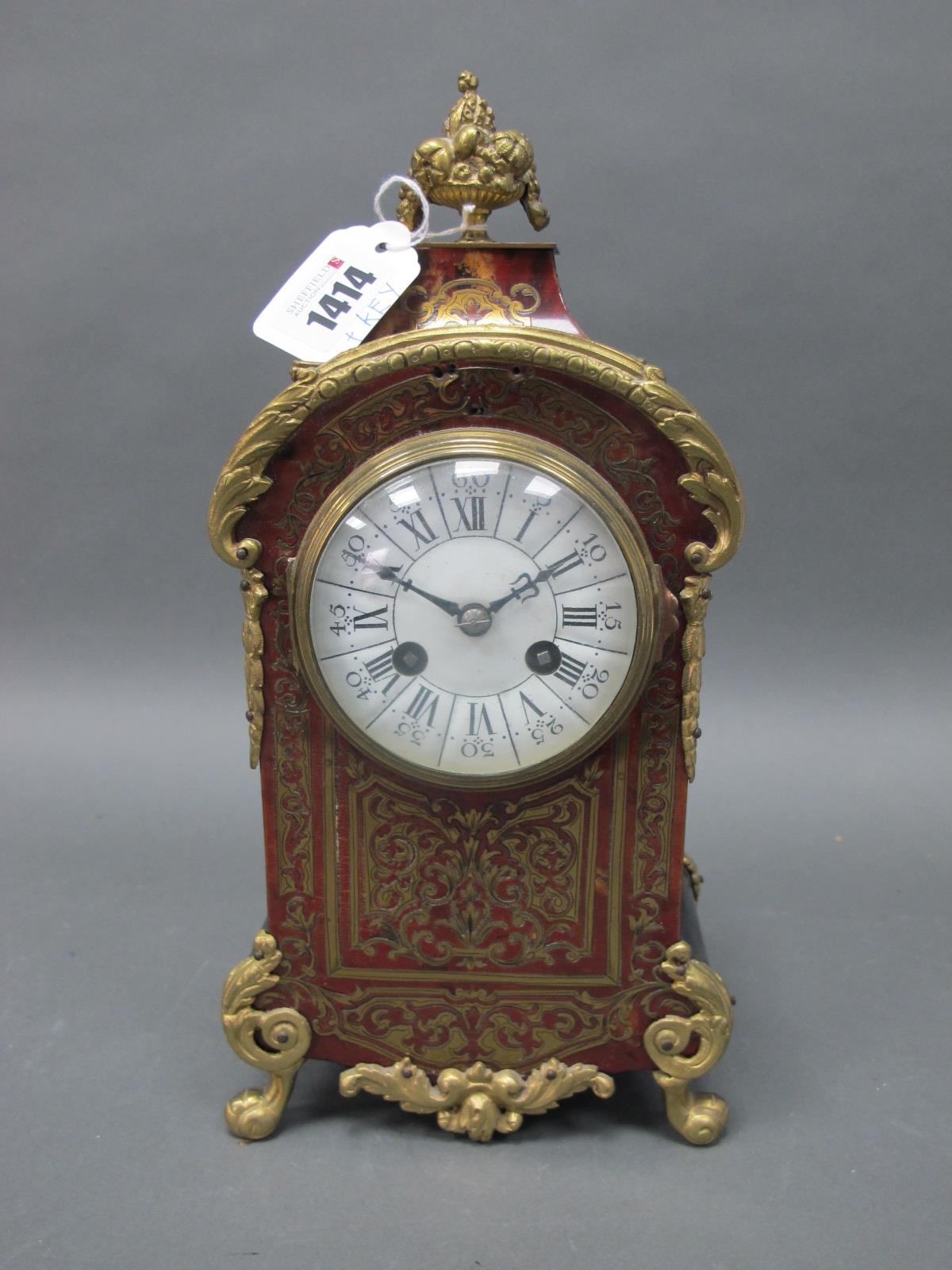 A Mid XIX Century French Boulle Mantle Clock, with ormolu mounts, the shaped rectangular body raised