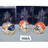 Three Royal Crown Derby Porcelain Paperweights, 'Ladybird (Seven Spot)', 'Blue Ladybird' and '