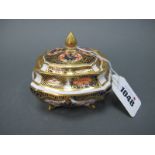 A Royal Crown Derby Porcelain Trinket Bowl and Cover, of shaped square footed form, decorated in