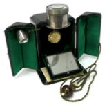 A Late XIX/Early XX Century Ever Ready Electric Ceiling Watch Stand, the black case opening out to