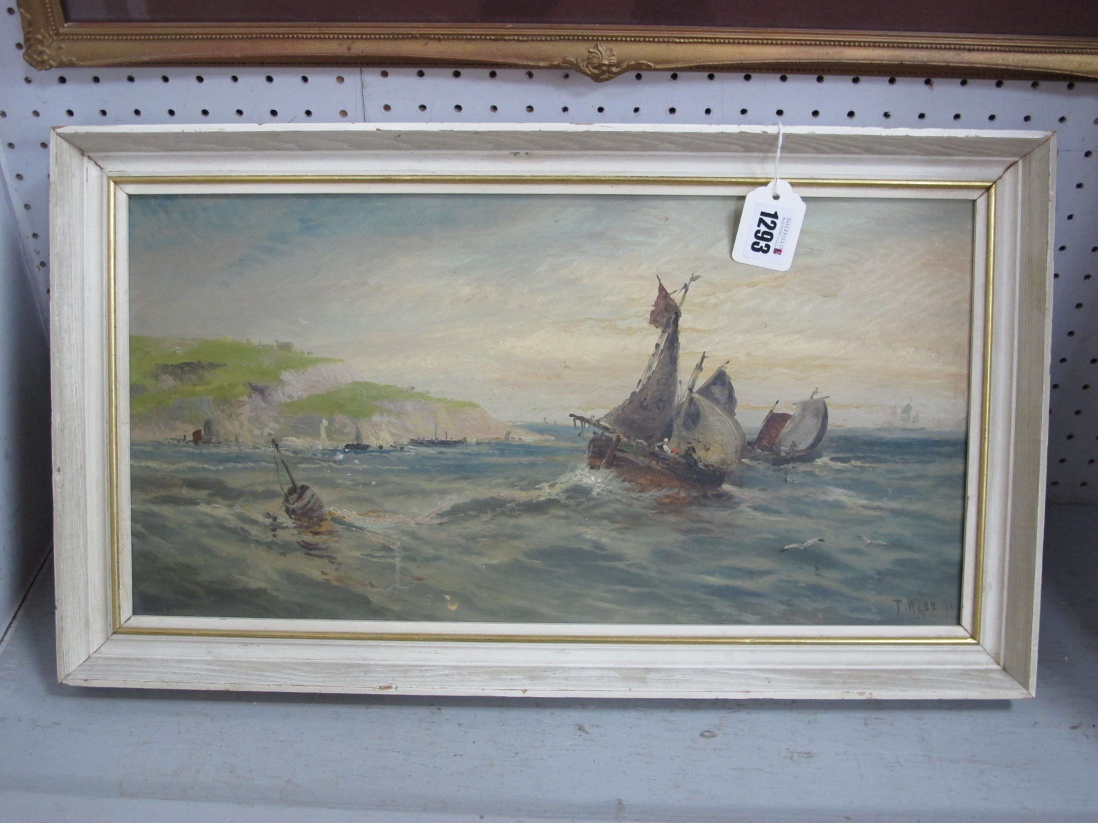 T. WEBB (English school) Seascape with Sailing Boats on a Shoreline, oil on board, signed lower