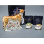 A Royal Crown Derby Porcelain Paperweight 'Cheetah', gold stopper, date code for 2015, 13cm high