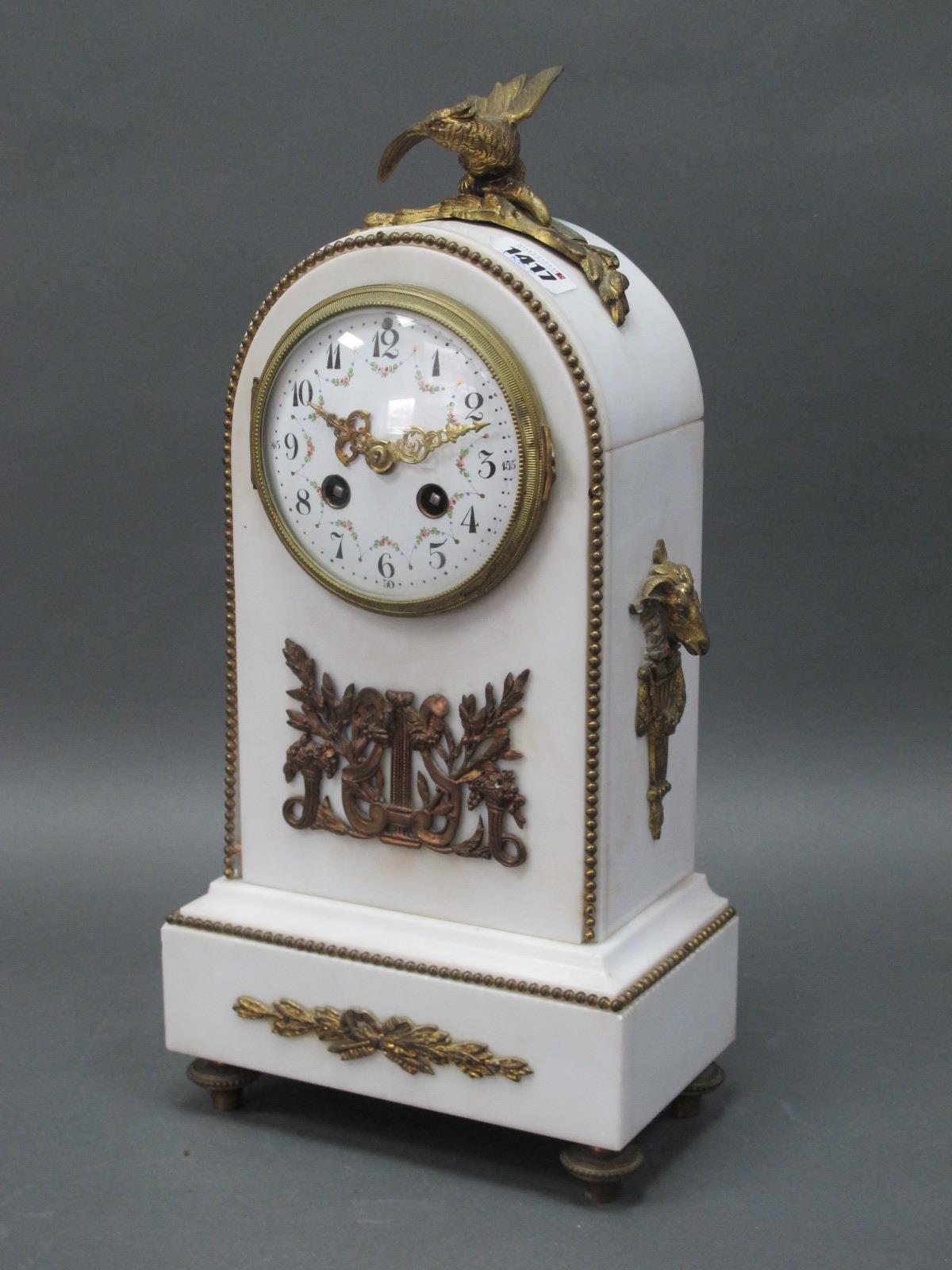 A French Mid/Late XIX Century White Marble Mantle Clock, with ormolu mounts and eagle surmount,