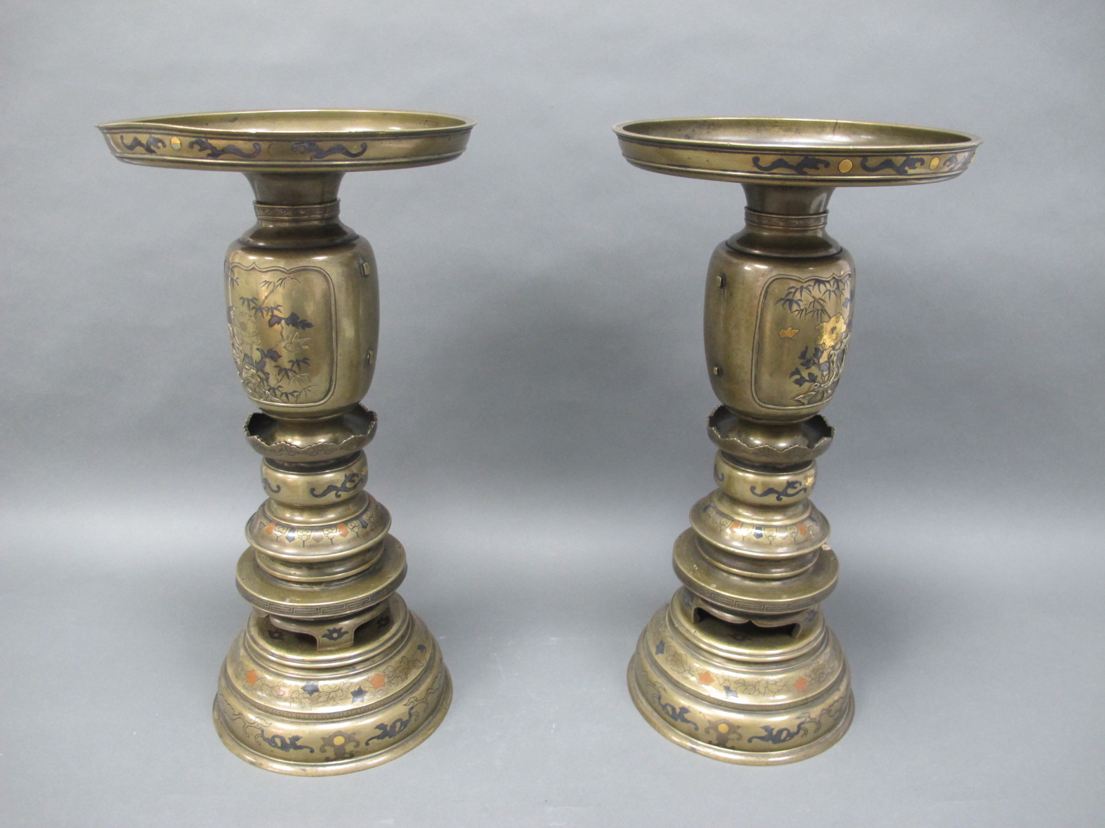 A Pair of Japanese Late XIX Century Three Sectional Brass Vases, with overlaid decoration of