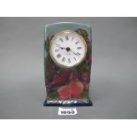 A Modern Moorcroft Mantle Clock, painted in the 'Finches' pattern against a shaded blue ground,