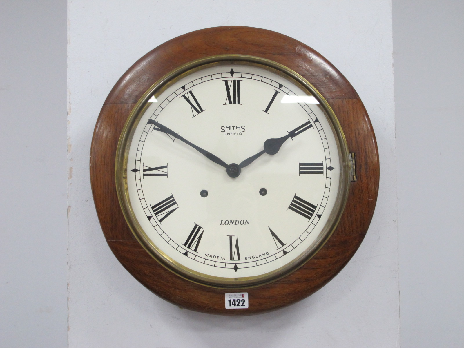 An Early XX Cenury Smith's Enfield Mahogany Cased Dial Wall Clok, with brass bezel and Roman