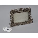 A Victorian Hallmarked Silver Rectangular Photograph Frame, William Comyns, London 1890, of openwork