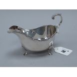 A Hallmarked Silver Sauce Boat, Walker & Hall, Sheffield 1932, with ribbon and reed border and