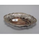 A Decorative Hallmarked Silver Dish, (maker's mark rubbed) London 1899, of shaped oval design with