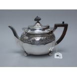 A Victorian Hallmarked Silver Tea Pot, H.S, Sheffield 1895, with foliate band detailed in relief,