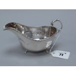 A Hallmarked Silver Sauce Boat, F&S, Chester 1939, with reed and reel border and leaf capped