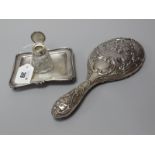 A Hallmarked Silver Inkstand, WCS&Co, Birmingham (date letter rubbed), of shaped rectangular form,