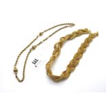 A Fancy Link Ropetwist Chain, stamped "15ct" (link damage) (17.5grams); A Gilt Metal Woven Choker