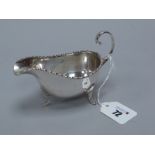 A Hallmarked Silver Sauce Boat, Walker & Hall, Birmingham 1932, with reed and border and flying