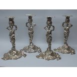 A Set of Four Impressive and Highly Decorative XIX Century Heavy Cast Candlesticks, of XVIII Century