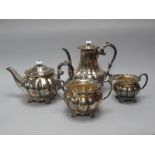 A Matched Hallmarked Silver Four Piece Tea Set, EV, Sheffield 1962, 1963, each of lobed design, with