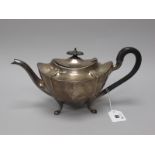 A Hallmarked Silver Teapot, CB&S, Sheffield 1918, of shaped design raised on four pad feet,