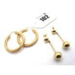 A Pair of Modern Hoop Earrings, of textured finish; A Pair of 9ct Gold Drop Earrings, (total