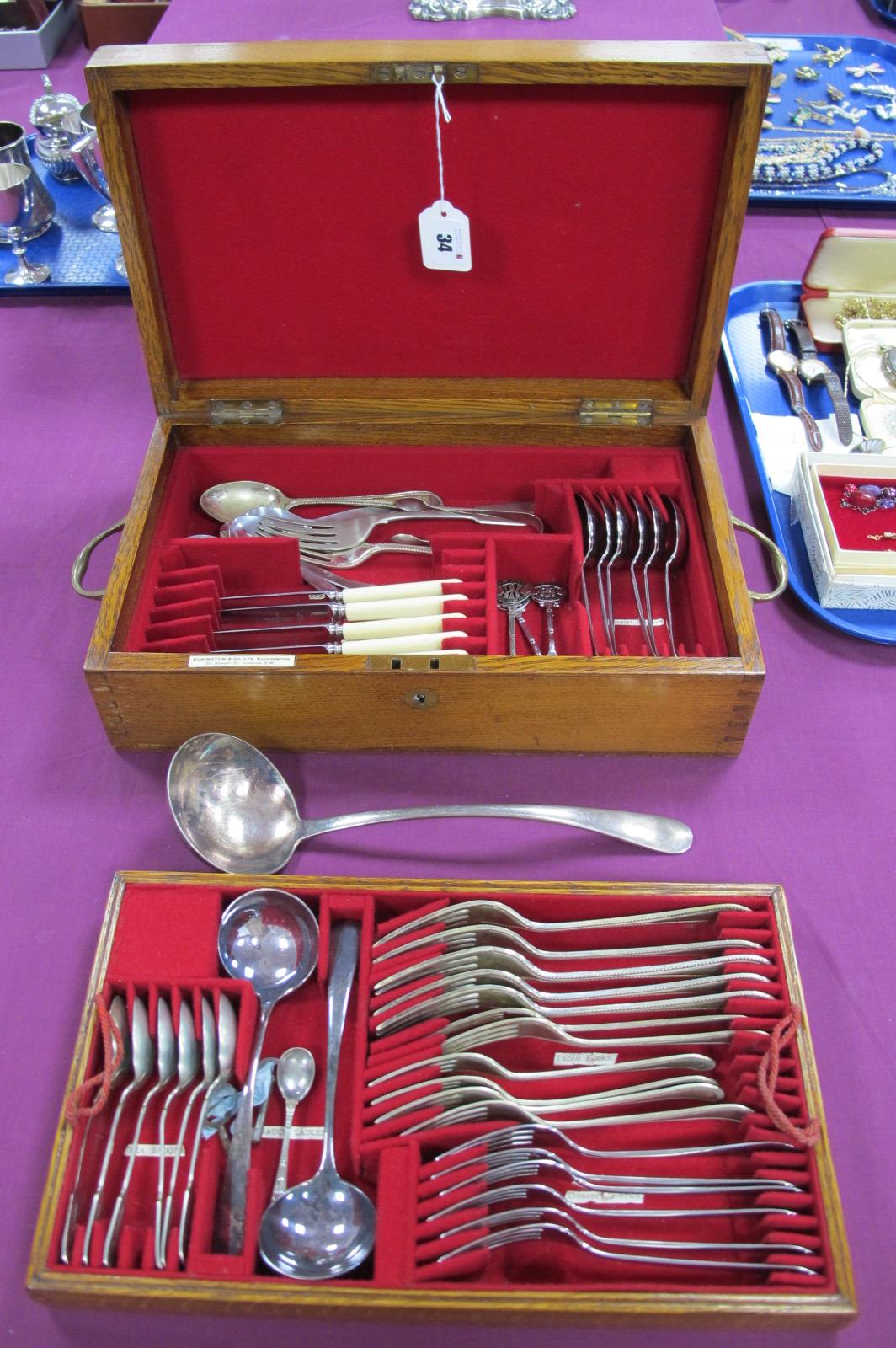 An Oak Cased Canteen of Assorted Plated Cutlery, including ladles, knives and forks, 'For Home and