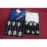 A Set of Six Hallmarked Silver Teaspoons, in a fitted case; together with a set of hallmarked silver