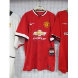 Manchester United Nike Home Shirt, bearing 'Chevrolet' logo and 11 black pen signatures (unverified)