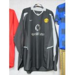 Manchcester United Nike Black Goalkeepers Shirt, bearing 'Vodafone' logo, 'Howard; and '14' to back,