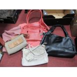 A Radley Black Leather Tote Bag, two further Radley bags in cream and salmon pink and a Calvin Klein