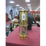 A Brass Miners Lamp by E, Thomas & Williams, Aberdare, Cambrian No 140879, 25.5cm high with handle