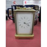 A Brass Carriage Clock, with carrying handle (cracks to face).