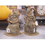 A Pair of Brass Door Stops in the form of Mr Punch 27cm high plus Judy.