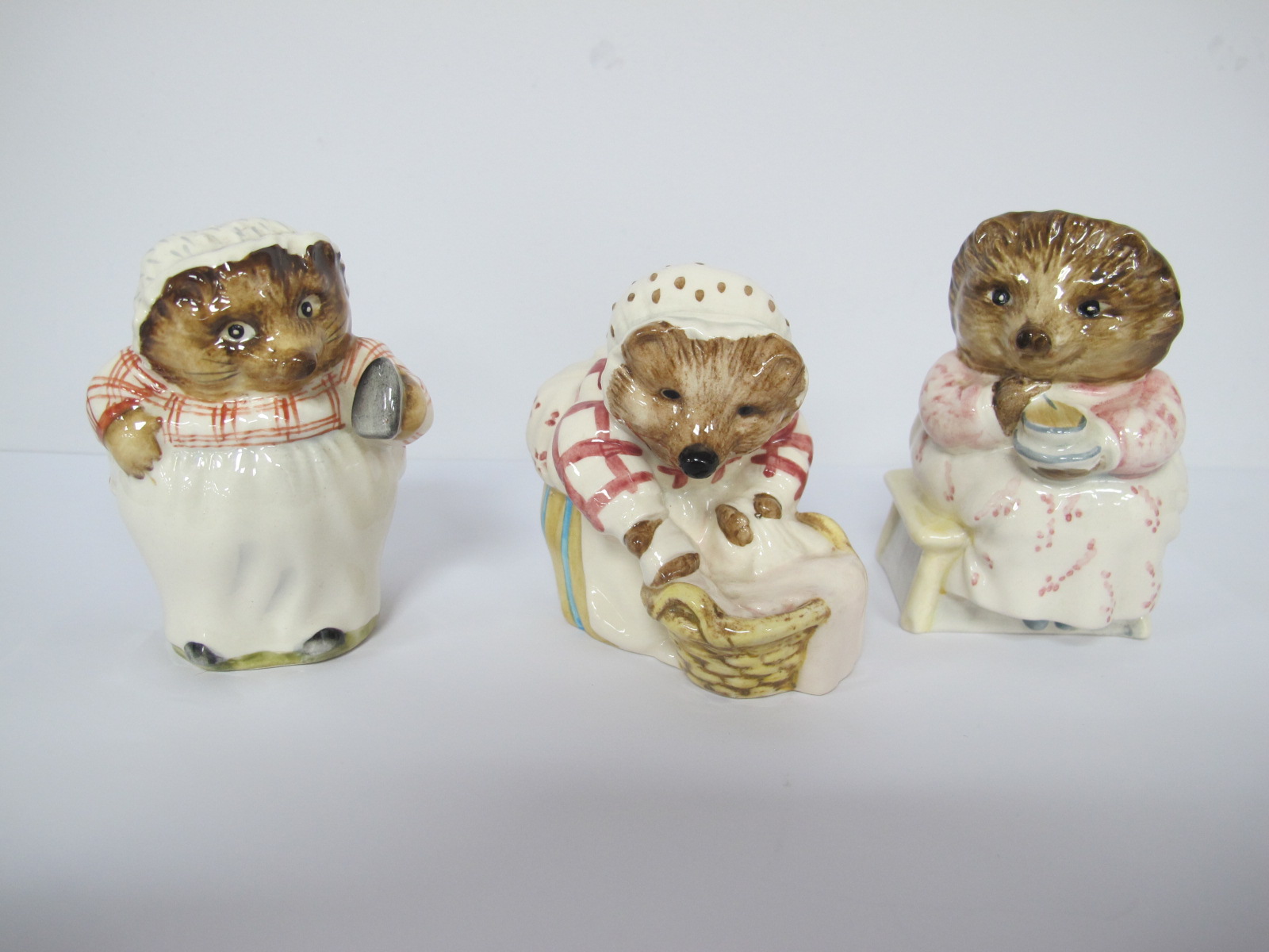 Beswick Beatrix Potter Figures, 'Mrs Tiggy Winkle', Mrs Tiggy Winkle Washing, Mrs Tiggy Winkle (3).