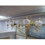 A Pair of Gilded Brass Five Branch Chandeliers, together with a pair of matching wall brackets. (