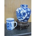A Chinese XIX Century Porcelain Tankard, painted in blue with a Chinoiserie river landscape,12cm