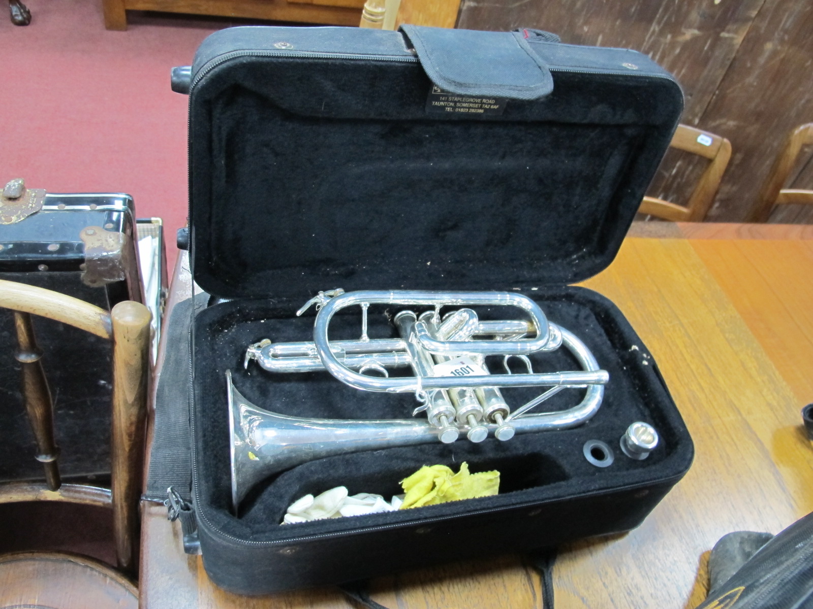 A Silver Plated Cornet, with mouth piece, in John Packer case.