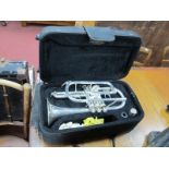 A Silver Plated Cornet, with mouth piece, in John Packer case.
