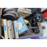 Cine Camera and Reels - Adventures of Popeye, The Count of Monte Cristo and other film reels, flat