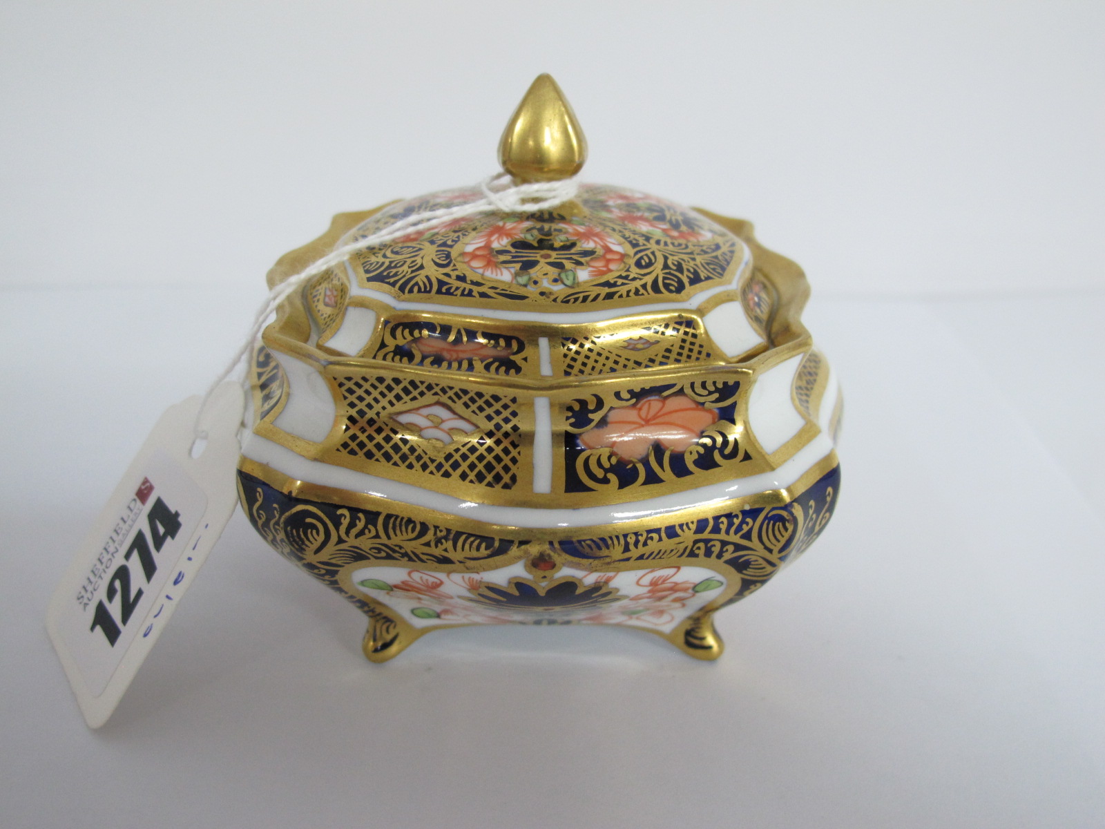 A Royal Crown Derby Porcelain Trinket Bowl and Cover, of shaped square footed form, decorated in