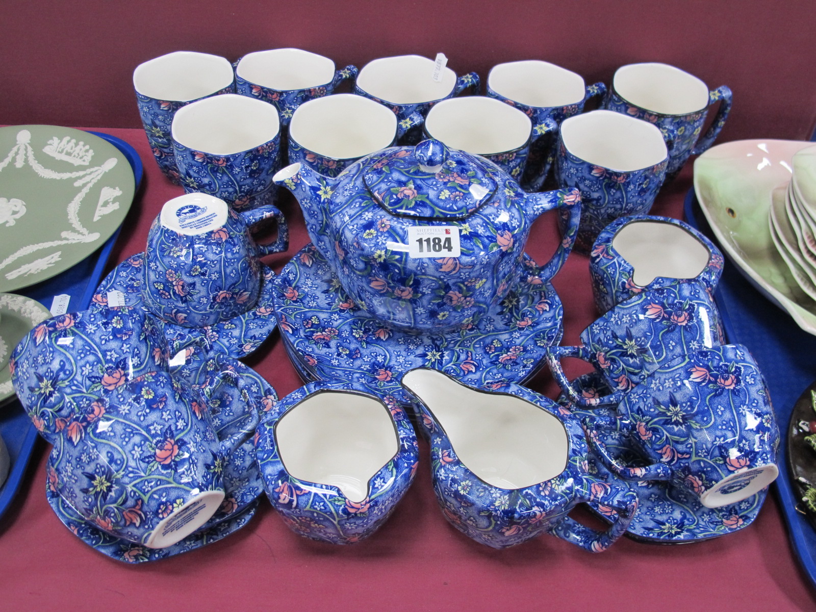 Rington's Chintz Table Pottery, of twenty six pieces, including teapot.