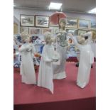 A Lladro Figurine of a Lady Holding a Parasol, 30cm high, plus thee others smaller, wearing