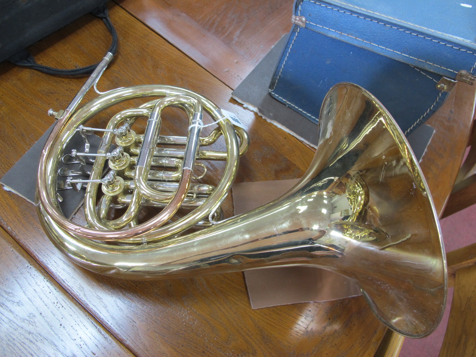 A John Packer JP 161 The Hornblower French Horn, in brass (damages).