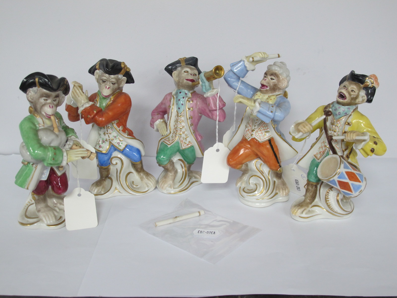 Five XX Century Dresden Porcelain Figurines, of Monkeys playing musical instruments, stamped Dresden