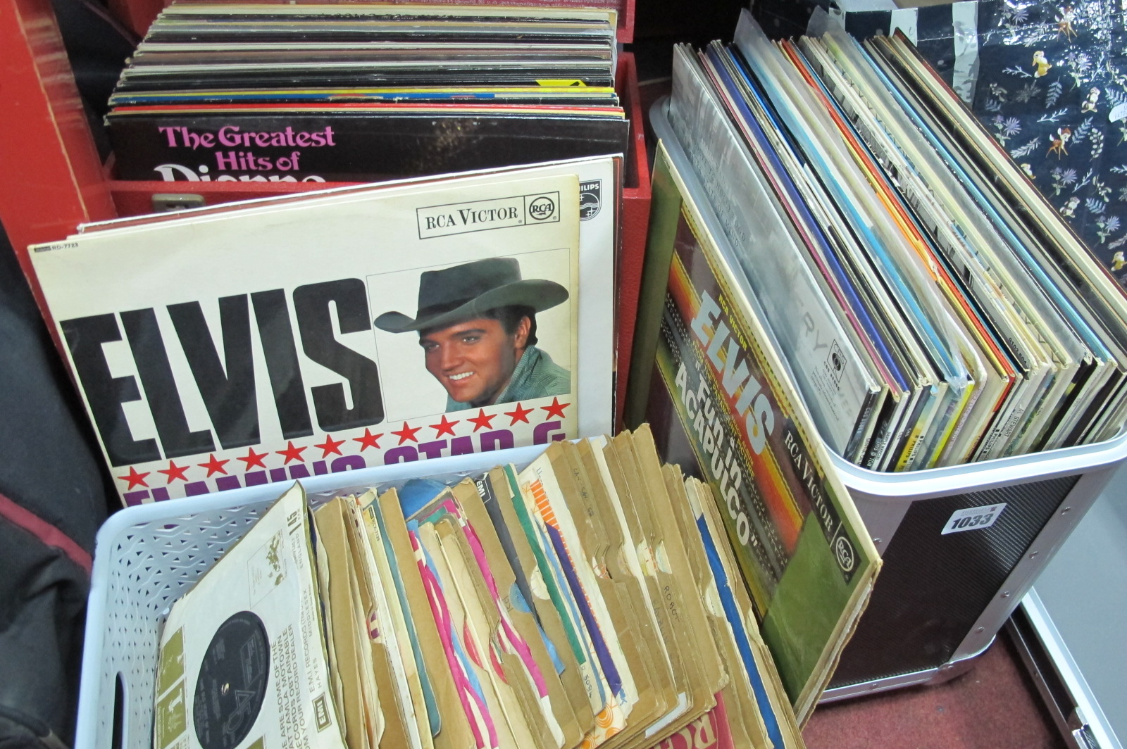 Two Cases of LP's and Approximately seventy signles, LP's include titles by Elvis Presley, Bee Gees,