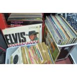 Two Cases of LP's and Approximately seventy signles, LP's include titles by Elvis Presley, Bee Gees,