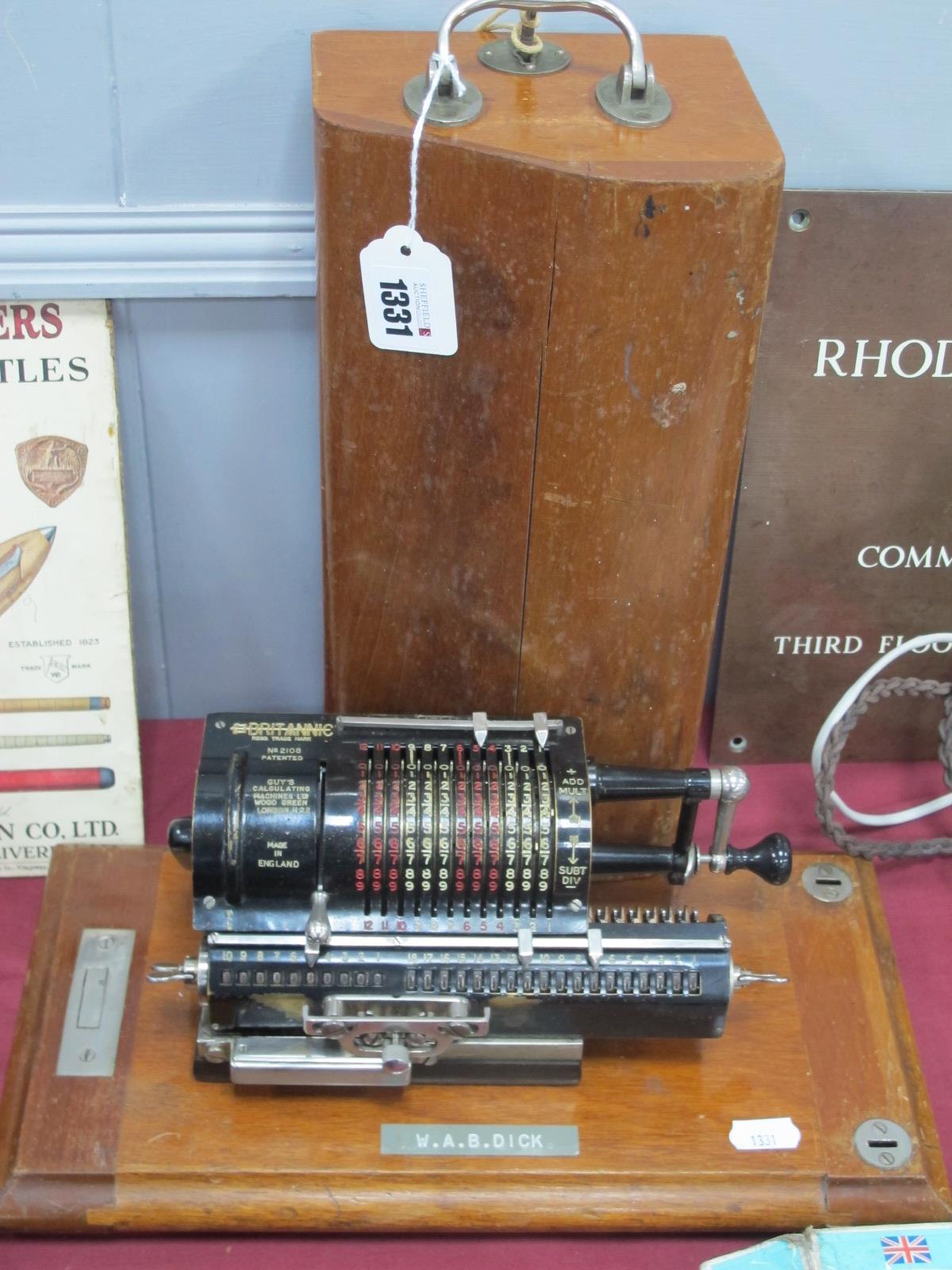 'Britannic' Guy's Calculating Machine, circa early XX Century, in wooden case, 35.5cm long.