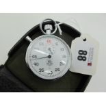 Tag Heuer; An Openface Pocket Stopwatch, the signed dial with black and red Arabic numerals and