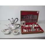 An Art Deco Style Electroplated Four Piece Tea Set, decorative set of cake forks and teaspoons, a