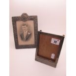 A Hallmarked Silver Mounted Rectangular Photograph Frame, together with another frame, on easel