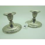 A Matched Pair of Hallmarked Silver Dwarf Candlesticks, BB, Birmingham 1899, 1900, of oval form with